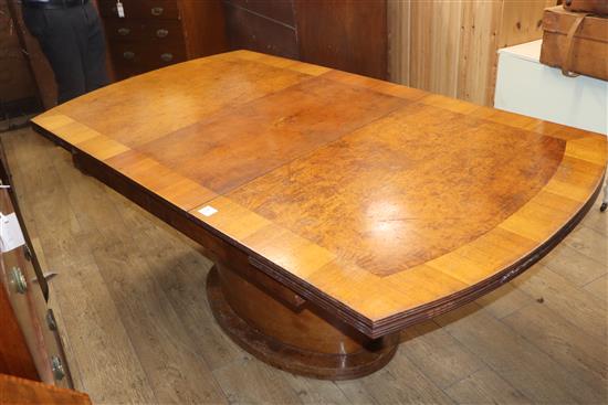 An Art Deco birds eye maple extending dining table 138cm